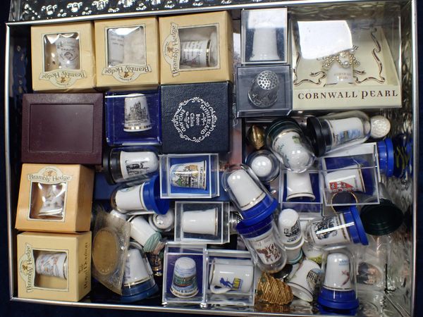 A COLLECTION OF DECORATED THIMBLES