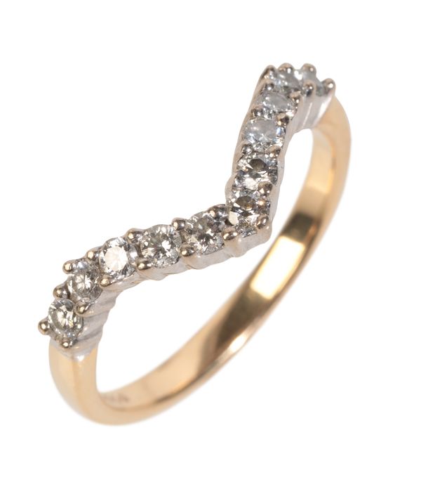 AN 18CT GOLD DIAMOND WISHBONE RING