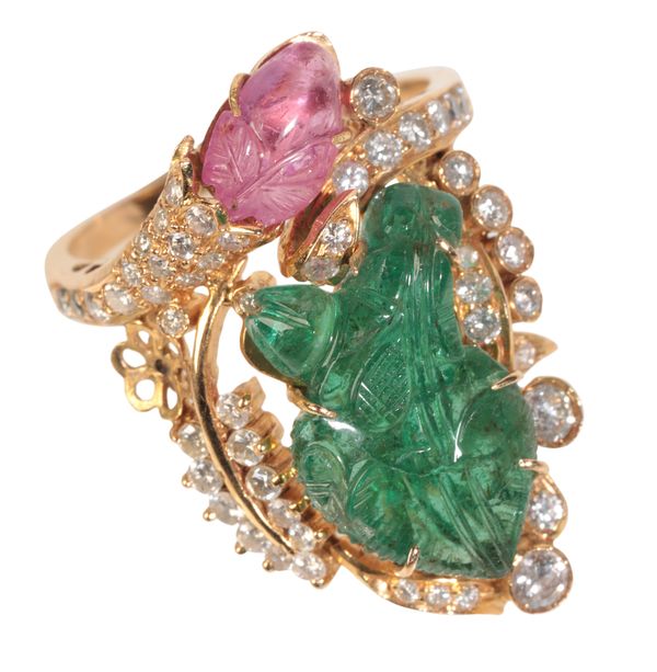 A CARVED GEM-SET RING