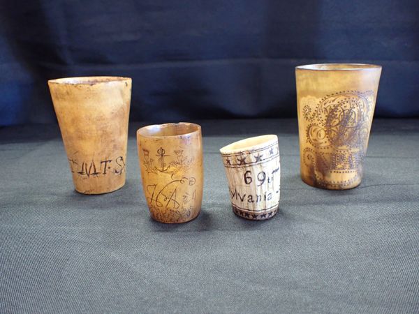 A COLLECTION OF HORN AND BONE BEAKERS