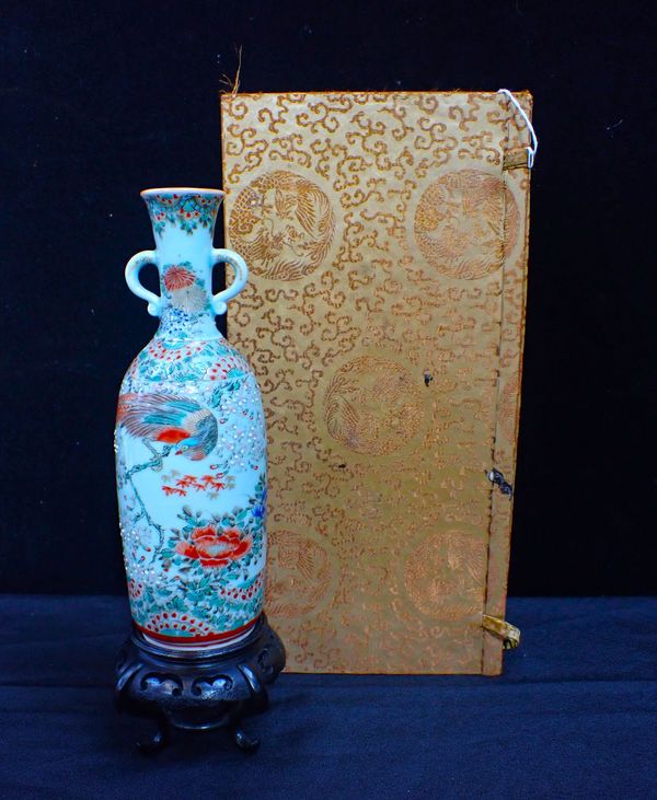 A JAPANESE TWIN-HANDLED VASE, PAINTED WITH BIRDS AND FLOWERS