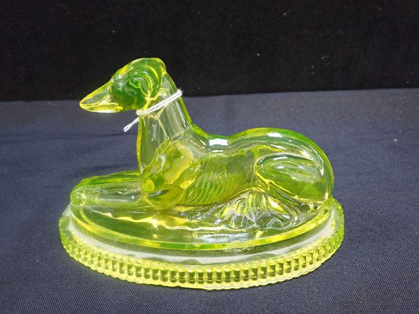 A JOHN DERBYSHIRE PRESSED GLASS GREYHOUND