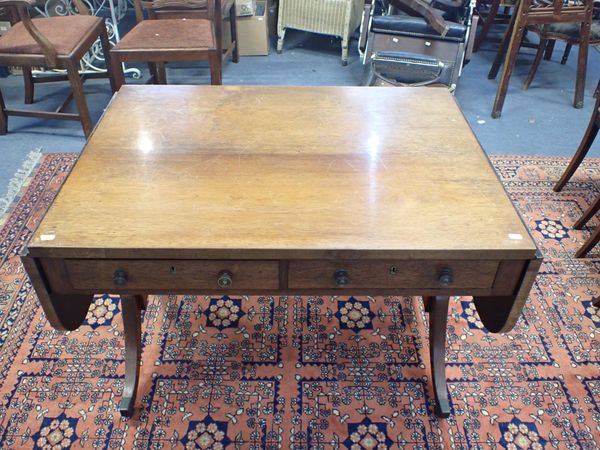 A REGENCY ROSEWOOD SOFA TABLE