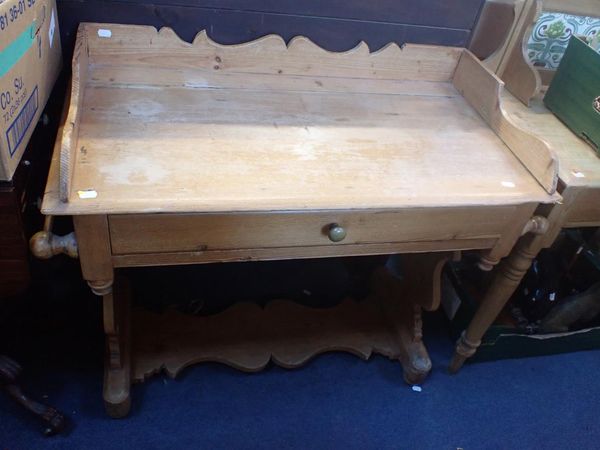 A VICTORIAN STRIPPED PINE WASHSTAND