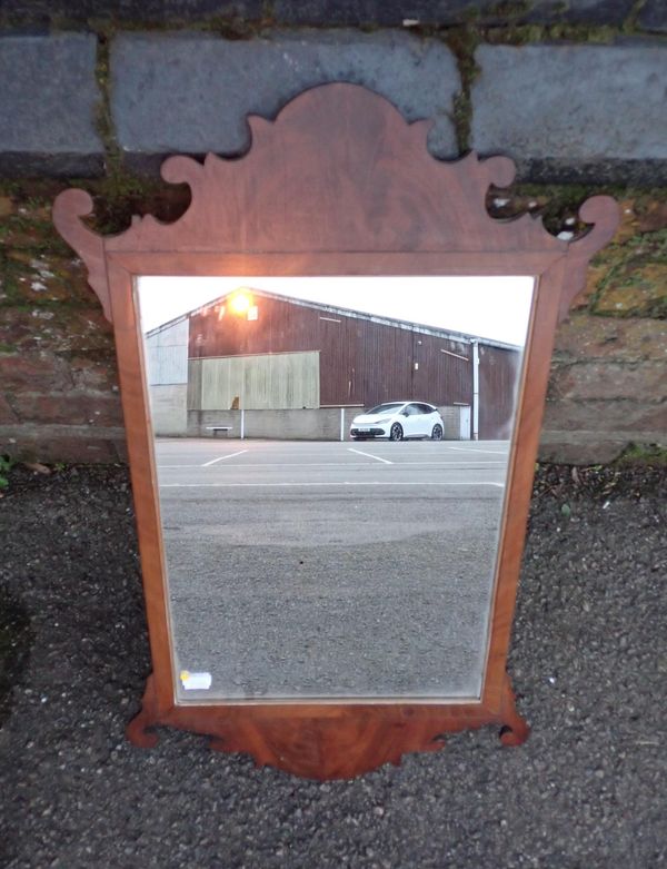 A GEORGE III STYLE MAHOGANY FRAMED WALL MIRROR