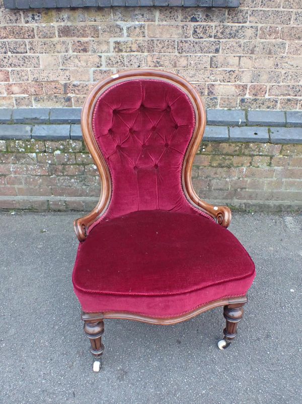 A VICTORIAN WALNUT SPOONBACK NURSING CHAIR