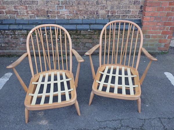 A PAIR OF ERCOL 203 BEECH FRAMED  WINDSOR ARMCHAIRS