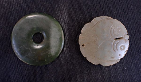 A  JADE BI DISC CARVED WITH TWO FISH