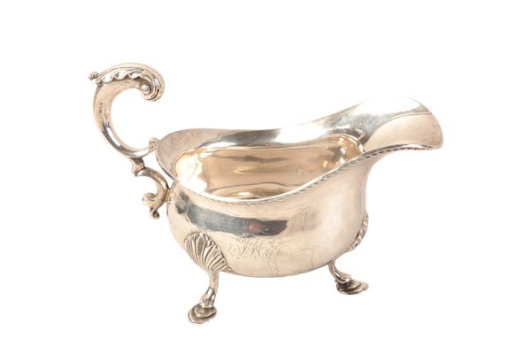 A LATE VICTORIAN SILVER SAUCE BOAT