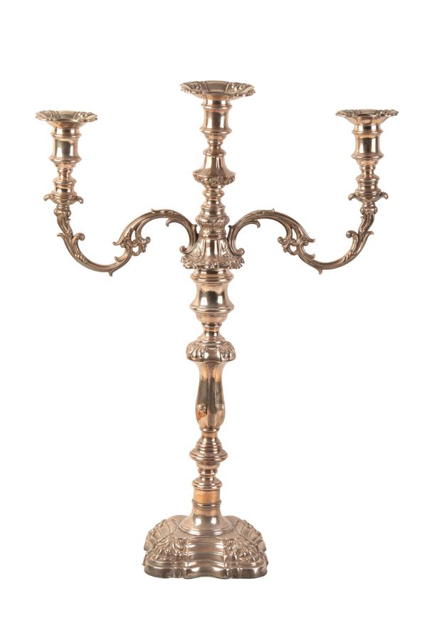 A SILVER PLATED THREE BRANCH CANDELABRA