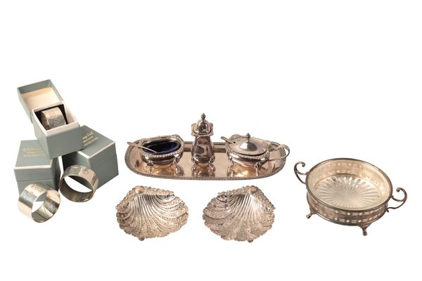 A PAIR OF LATE VICTORIAN SILVER SCALLOP SHAPED BUTTER DISHES