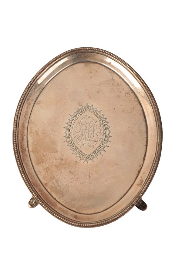 A GEORGE III SILVER OVAL TEAPOT STAND