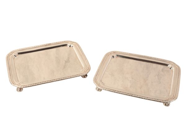 A PAIR OF GEORGE III SILVER RECTANGULAR CARD TRAYS OR WAITERS