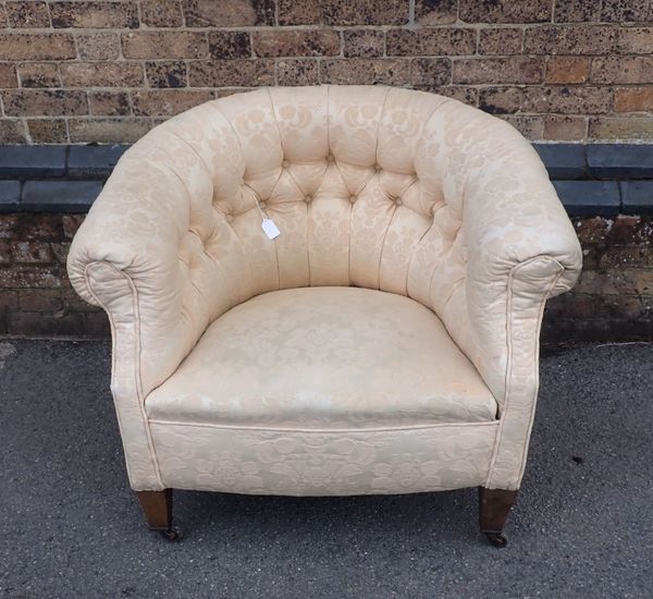 AN EDWARDIAN TUB CHAIR