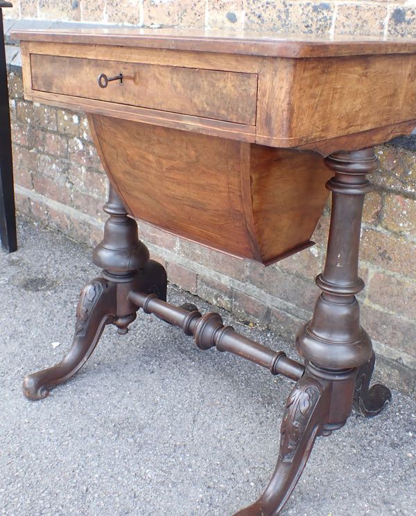 A VICTORIAN WALNUT WORKTABLE