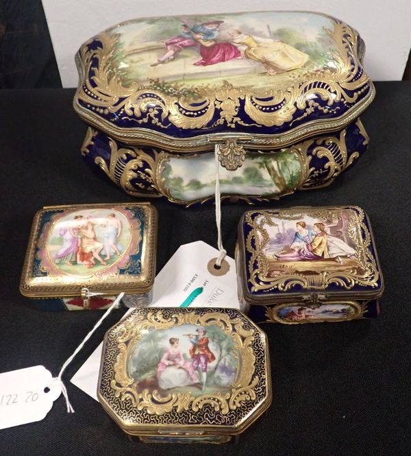 A CONTINENTAL PORCELAIN AND GILT METAL MOUNTED CASKET