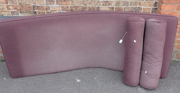 A DAY BED CUSHION AND TWO MATCHING BOLSTER CUSHIONS