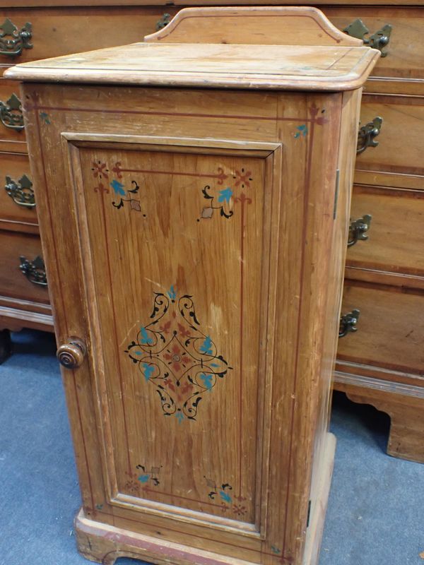 A VICTORIAN PINE POT CUPBOARD WITH ORIGINAL PAINTED DECORATION