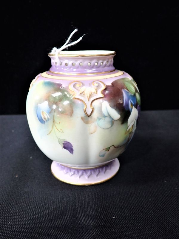 A ROYAL WORCESTER POT DECORATED WITH SWEET PEAS