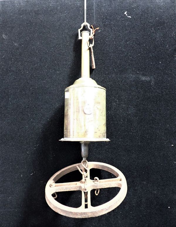 A 19TH CENTURY BRASS BOTTLE SPIT JACK