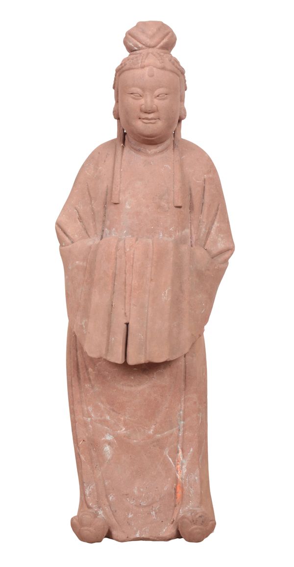 A CHINESE RED SANDSTONE FIGURE OF A COURT LADY