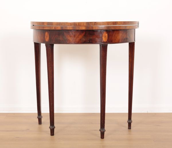 A GEORGE III FIGURED MAHOGANY TEA TABLE OF SMALL PROPORTION