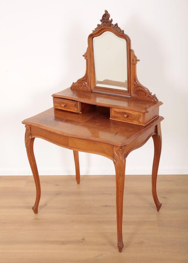 A FRENCH LOUIS XV STYLE WALNUT AND OAK DRESSING TABLE