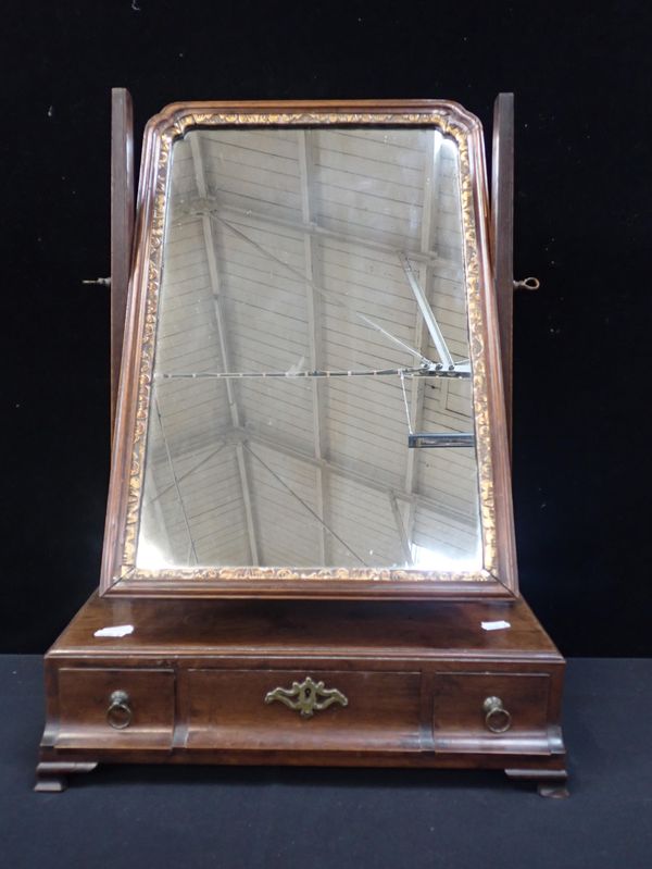 AN EARLY GEORGE III MAHOGANY TOILET MIRROR