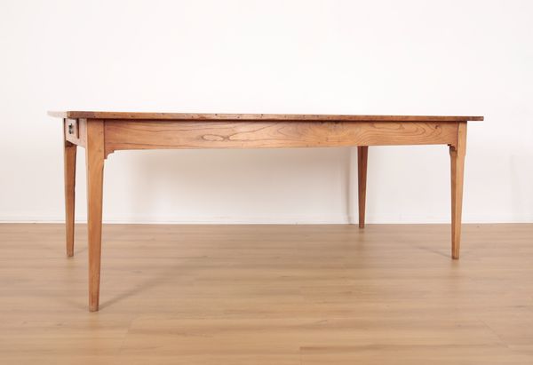 A FRENCH CHERRYWOOD FARMHOUSE TABLE