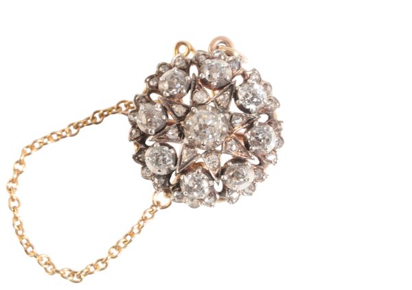 AN EDWARDIAN DIAMOND STAR BROOCH/PENDANT