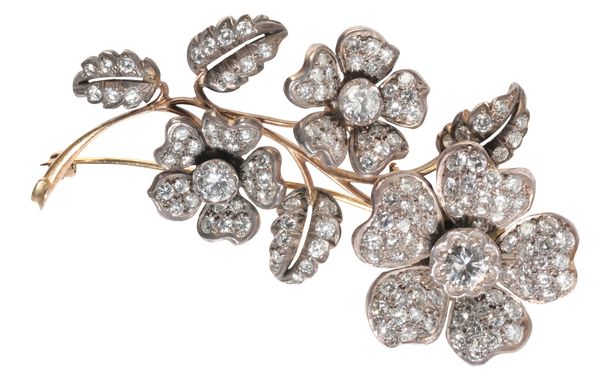 A DIAMOND FLORAL SPRAY BROOCH