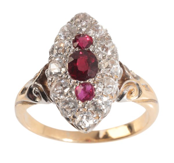 AN EDWARDIAN RUBY AND DIAMOND NAVETTE RING