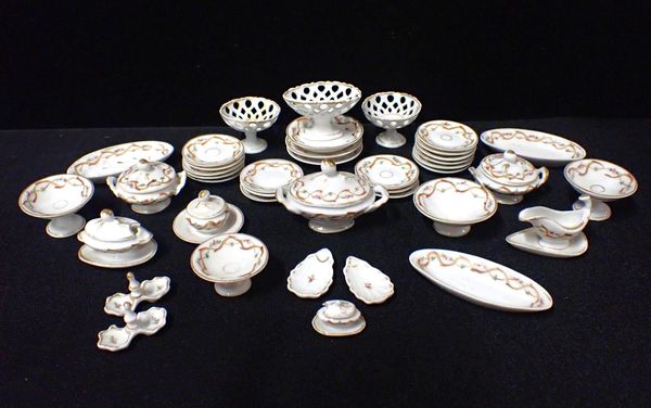 A LATE VICTORIAN MINIATURE OR TOY DINNER SERVICE