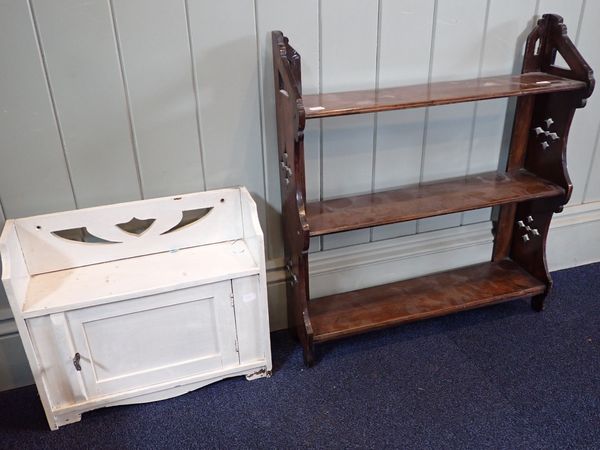 A VICTORIAN WALNUT WALL HANGING SHELF