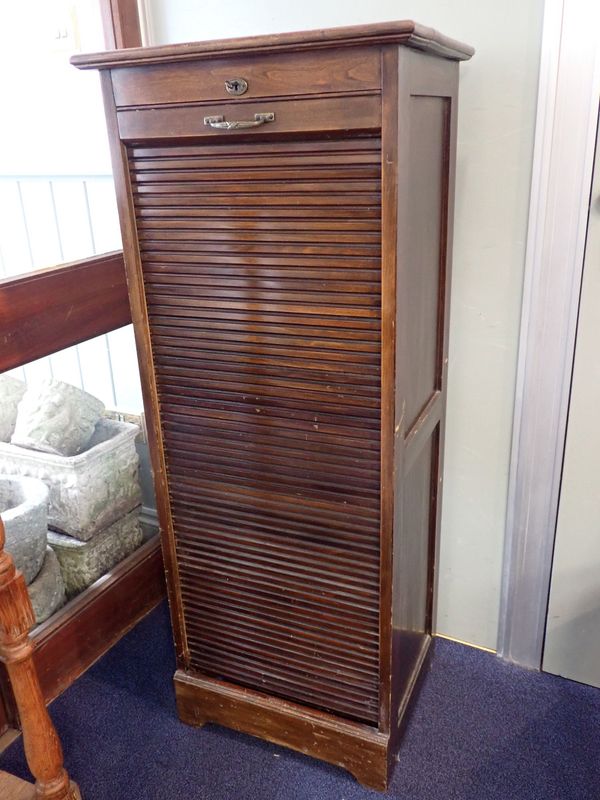 A 1920s TAMBOUR-FRONT FILING CABINET