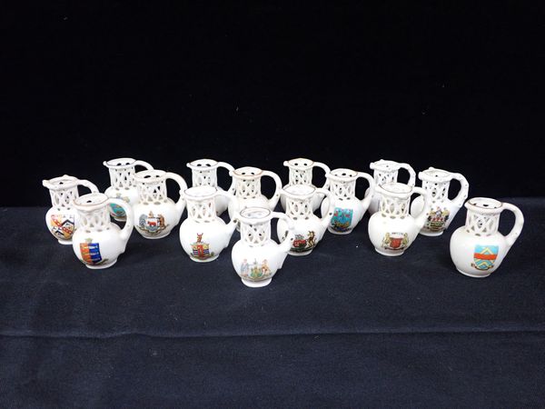 A COLLECTION OF CRESTED WARE MINIATURE PUZZLE JUGS