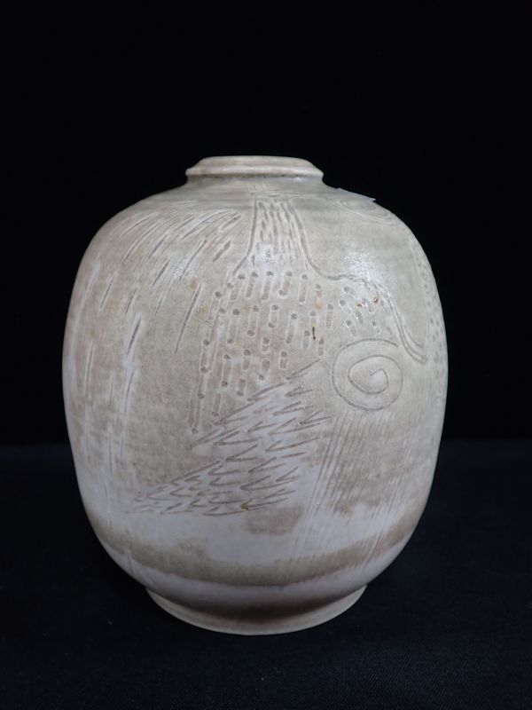 AN ART POTTERY VASE WITH SGRAFFITO DECORATION