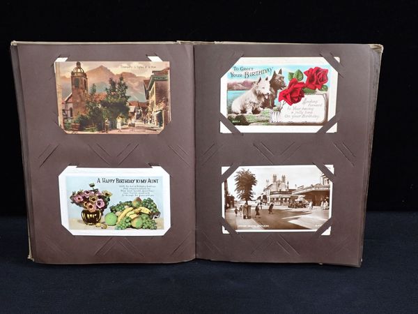 A POSTCARD ALBUM, TOPOGRAPHICAL, GREETINGS