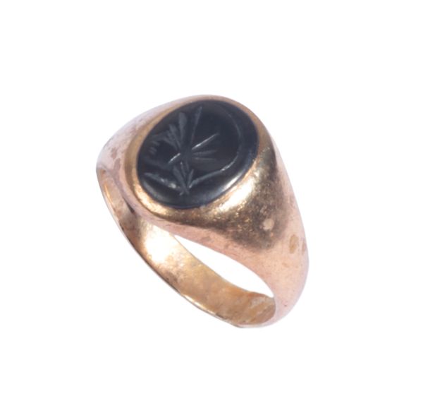 A BLACK ONYX SIGNET RING