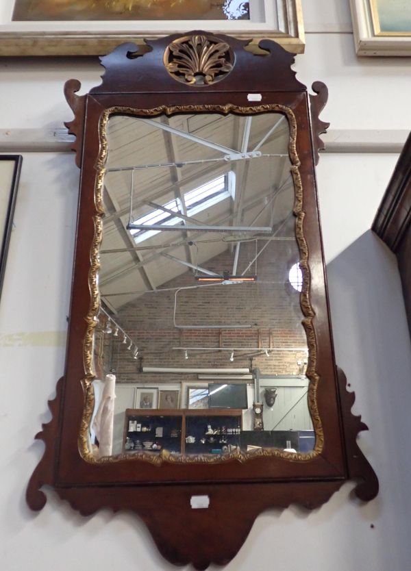 A MAHOGANY RECTANGULAR WALL MIRROR OF GEORGE II DESIGN