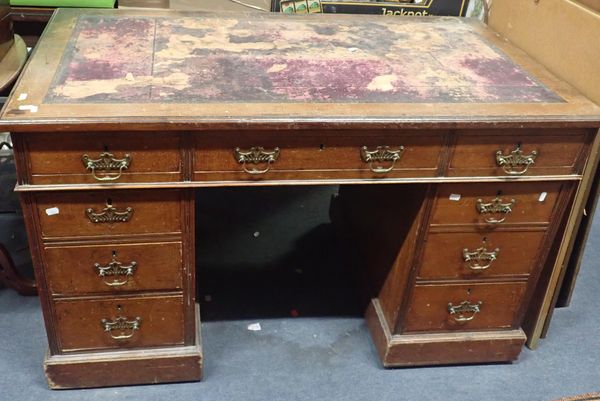 A LATE VICTORIAN WALNUT PEDESTAL DESK