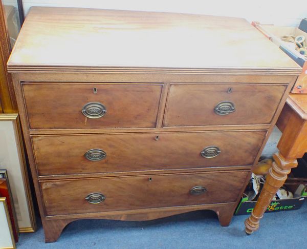 A GEORGE III FIGURED MAHOGANY CHEST OF DRAWERS