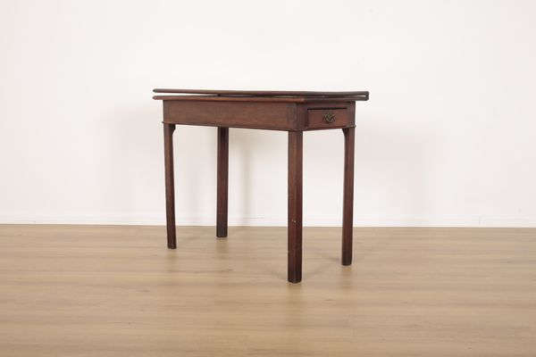 A GEORGE III MAHOGANY TEA TABLE