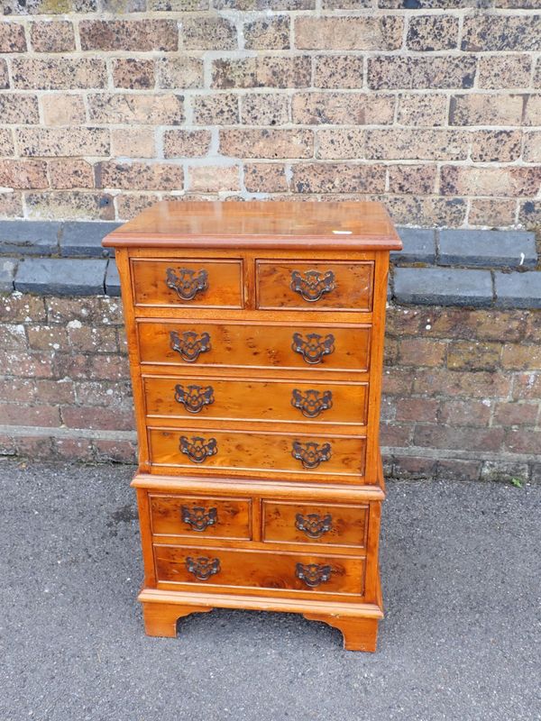 A REPRODUCTION YEW-WOOD FINISH MINIATURE TALLBOY