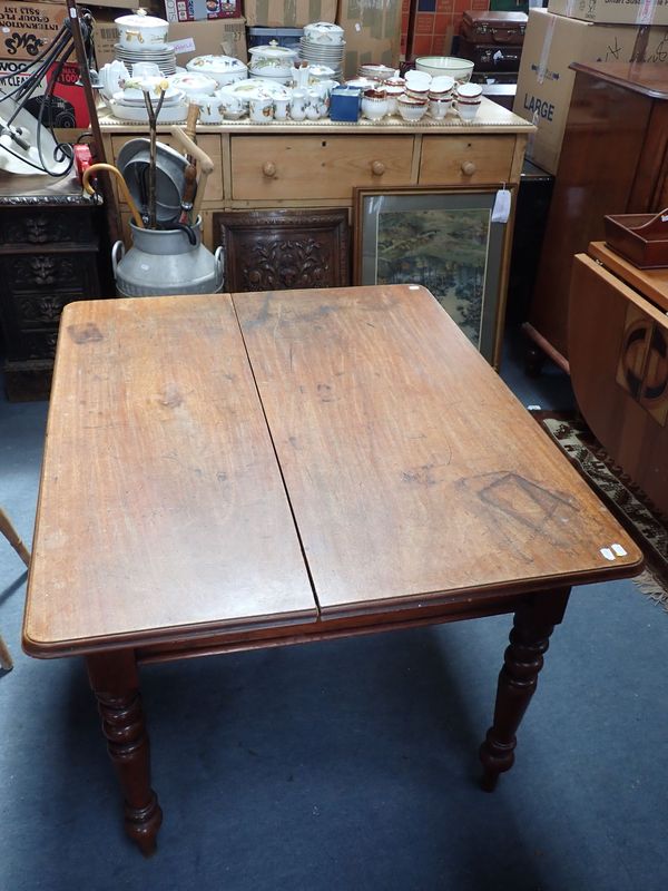 AN EARLY VICTORIAN MAHOGANY LIBRARY OR DINING TABLE