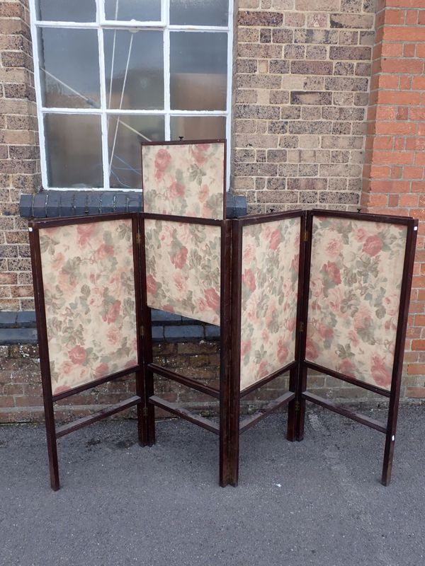 A MAHOGANY FRAMED FOUR-PANEL SCREEN