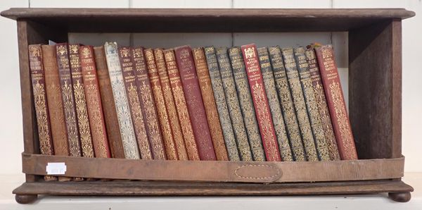 A MINIATURE OAK TABLE TOP BOOKCASE