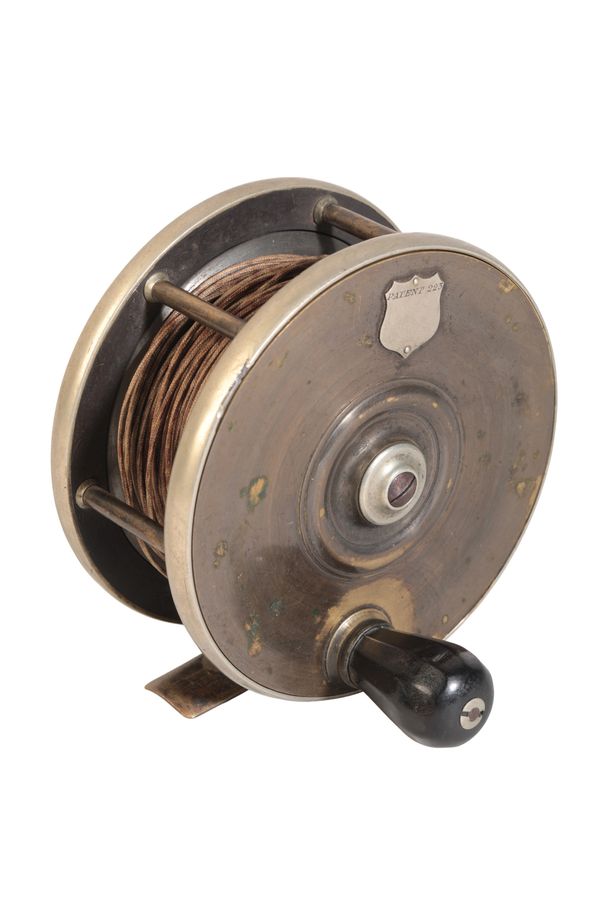 MALLOCH PATENT 293: AN EBONITE AND BRASS "SUN AND PLANET" FLY REEL