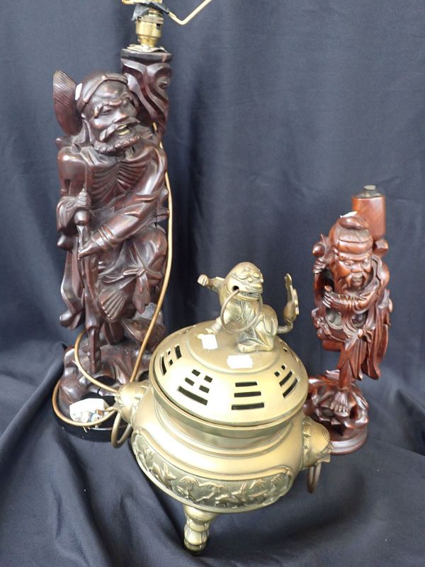 A CHINESE CARVED WOOD FIGURAL TABLE LAMP