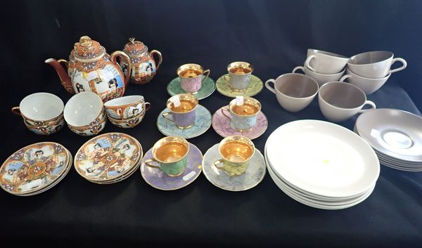 A JAPANESE PART TEA SERVICE, WITH 'GEISHA ' BASE CUPS